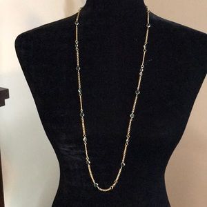 Gold necklace with blue stones